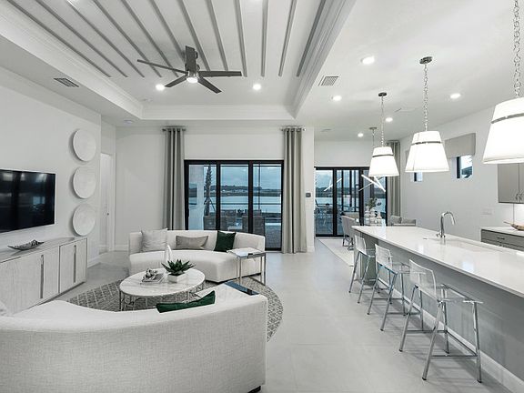 Model Representation -Kitchen island overlooking gathering room