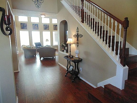 NO Carpet downstairs ! Laminate hardwoods throughout