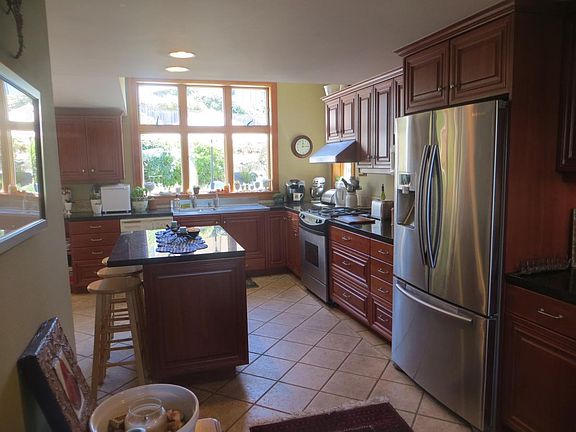 Kitchen with new refrigerator with ice-maker; Kitchenaid mix