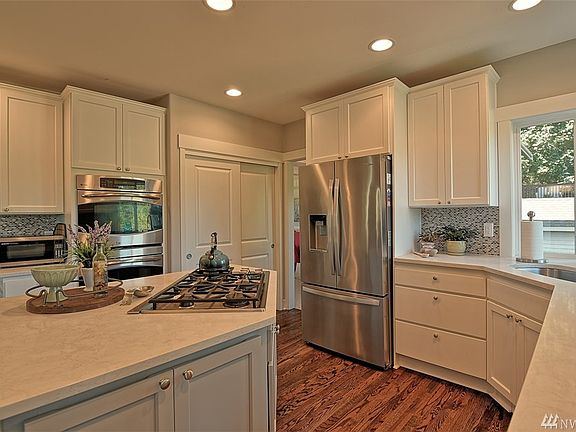 Double ovens, large pantry, tons of storage, Miele dishwasher and Whirlpool French door style refrigerator - all appliances stay with the home.