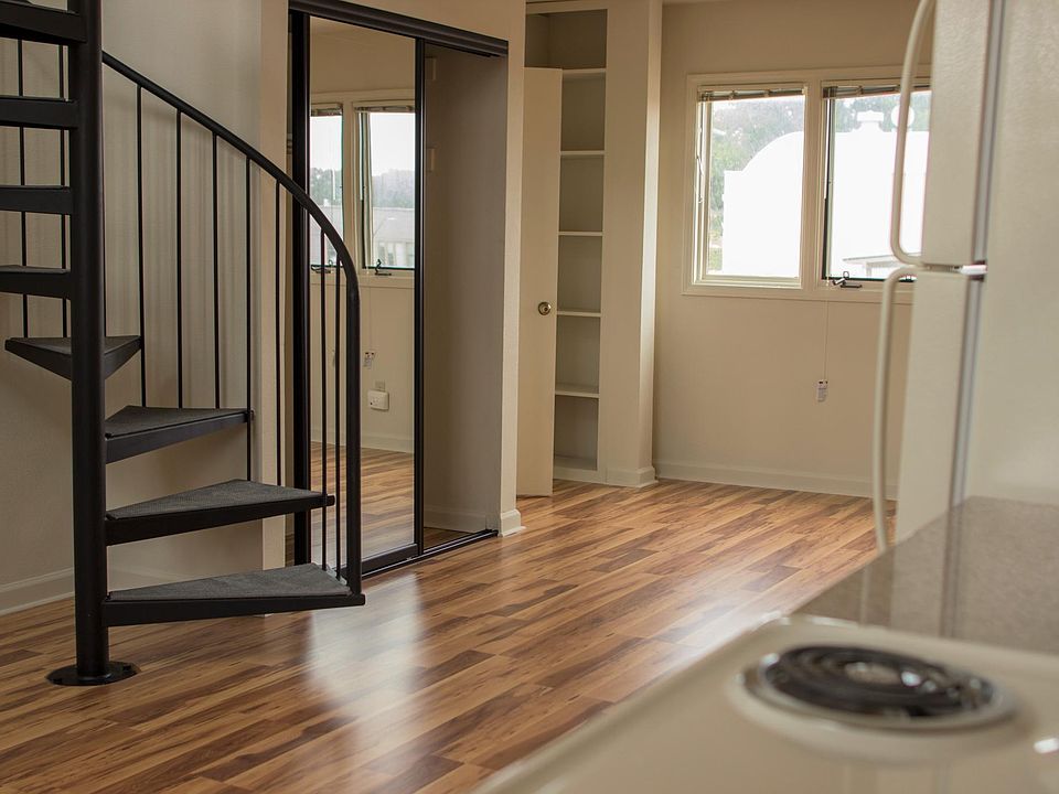 Stairs to loft bedroom. Closet and storage closet.