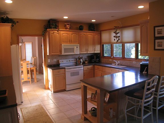 Kitchen Maple Cabinets & Corian Counters