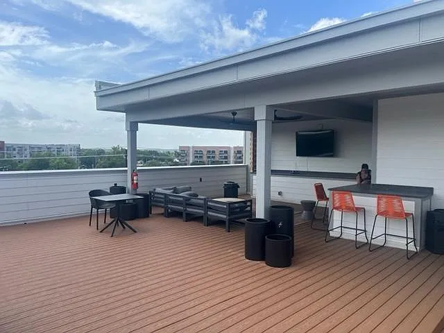 4th Floor Rooftop (w/ TV, couches)