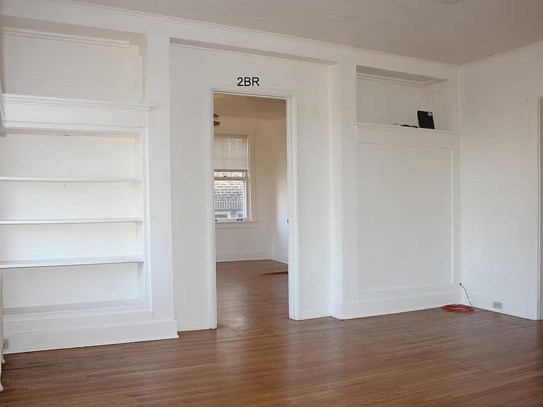 LR, buil-in bookcase, entry to 2BR