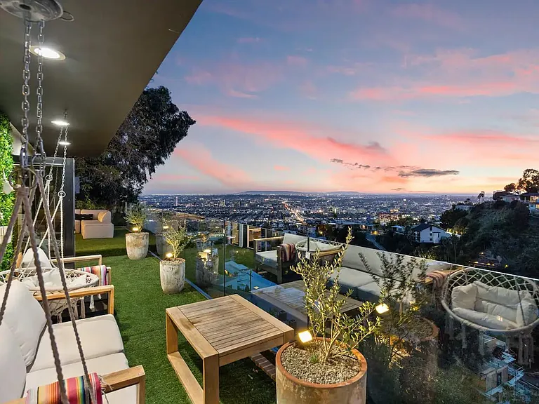 Experience the height of luxury living with panoramic views of LA.