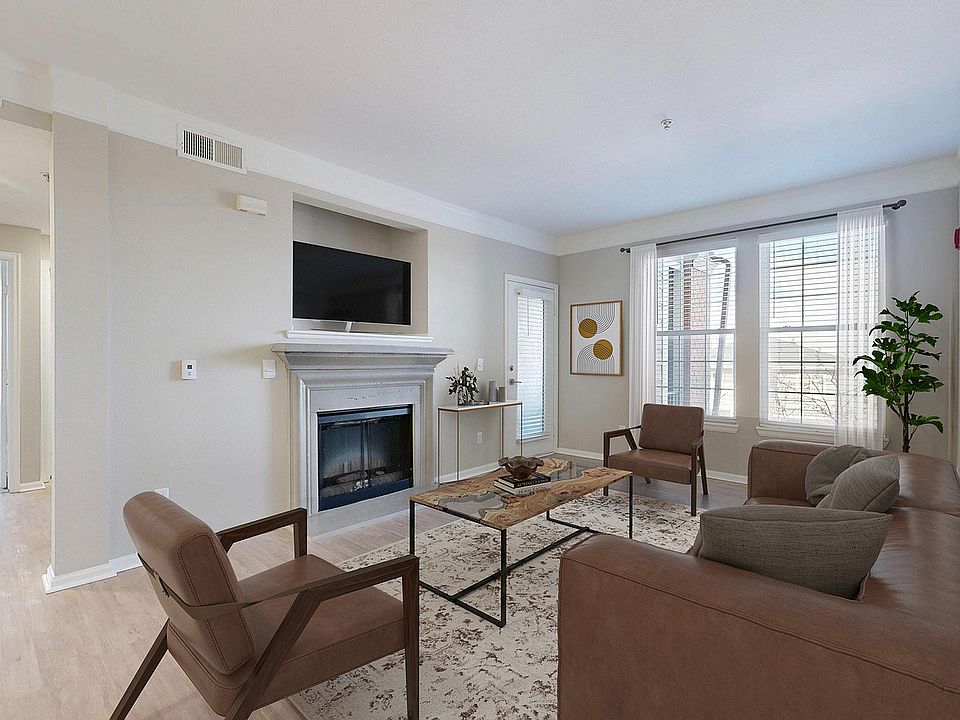 Newly Renovated Living Room with Gorgeous Hardwood-Style Flooring