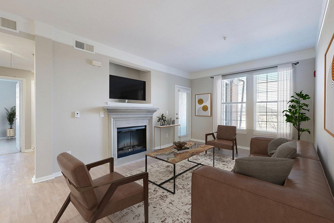 Newly Renovated Living Room with Gorgeous Hardwood-Style Flooring