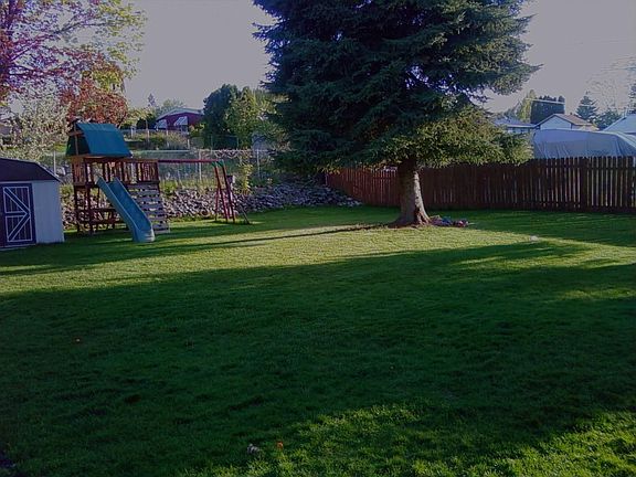 Private 12,330 sq ft fully sprinklered yard.