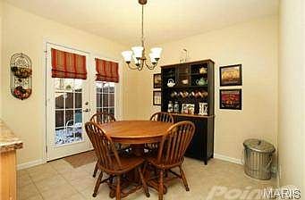 Breakfast room- note the stylish light fixtures throughout!