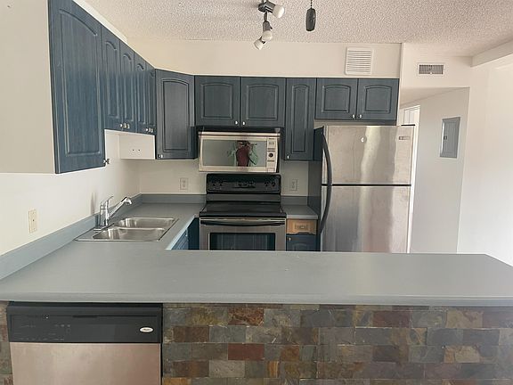 2nd image of 11825 71st St NW #404