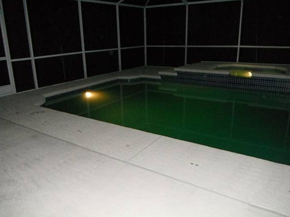 Pool Lit Up At Night