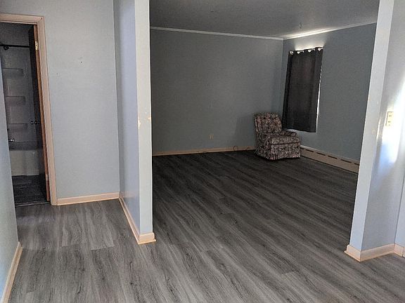 Standing in entry ... living room and to bath and bedroom 1