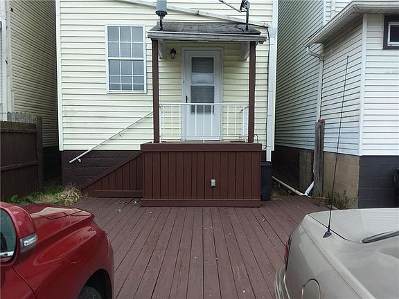 Back of house with parking
A deck