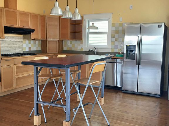 Brand new fridge, brand new dishwasher, brand new 5 burner gas-range top, 2 ovens (and new washer and dryer in unit).