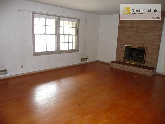 Living Room with hardwood floors, fireplace and good light.