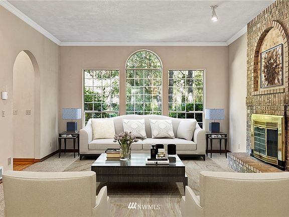 Virtually staged, formal living room.