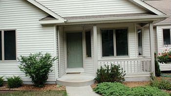 Wonderful Front Entrance to the Home with a Little Side porch...