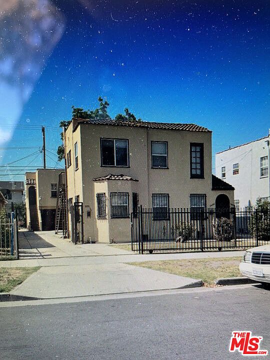 1st image of 1050 W 60th Pl Unit 1/2