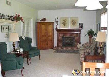 family room with gas-log fireplace.
