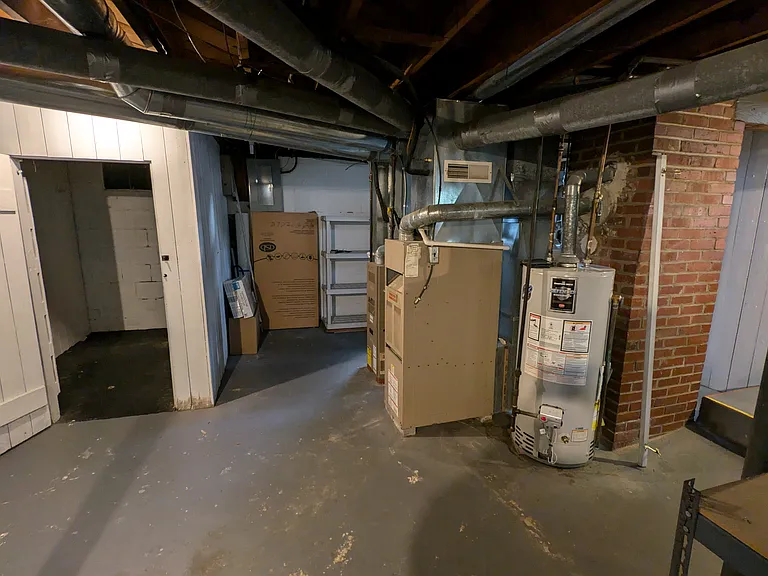 Additional storage closet in basement.