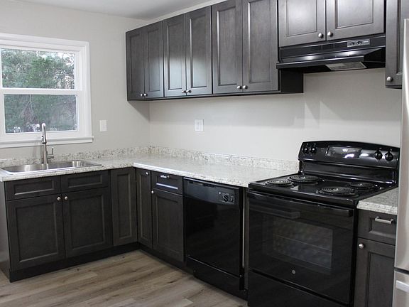 Walk out to the back yard from the newly remodeled kitchen.