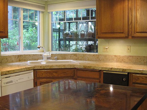 Kitchen with granite and copper tops