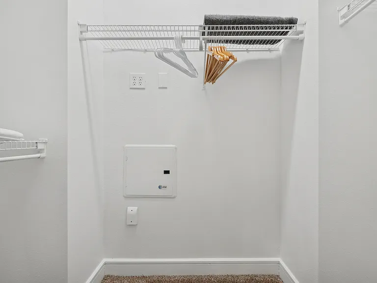 Experience organization at its best with this spacious walk-in closet. Experience organization at its best with this spacious walk-in closet.