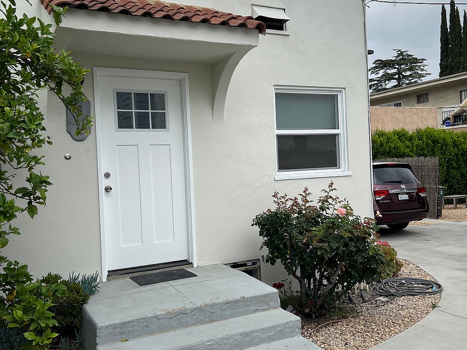 Front Door and Parking space next to it.