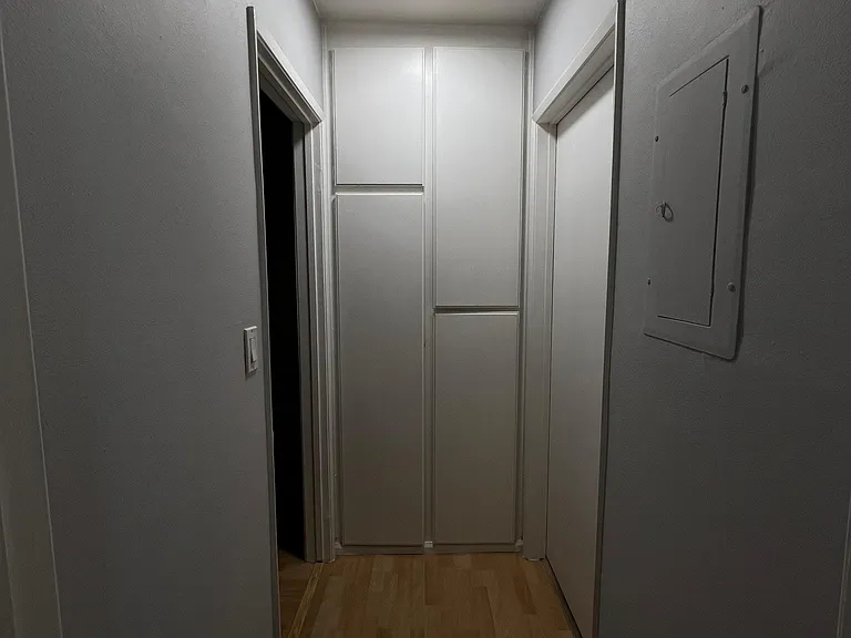 Please note: Pre-renovation photo shown for layout reference. Brand-new flooring has since been installed.