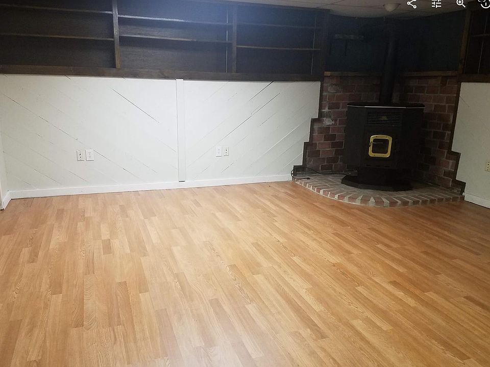 Oversized bedroom with built-in shelves.