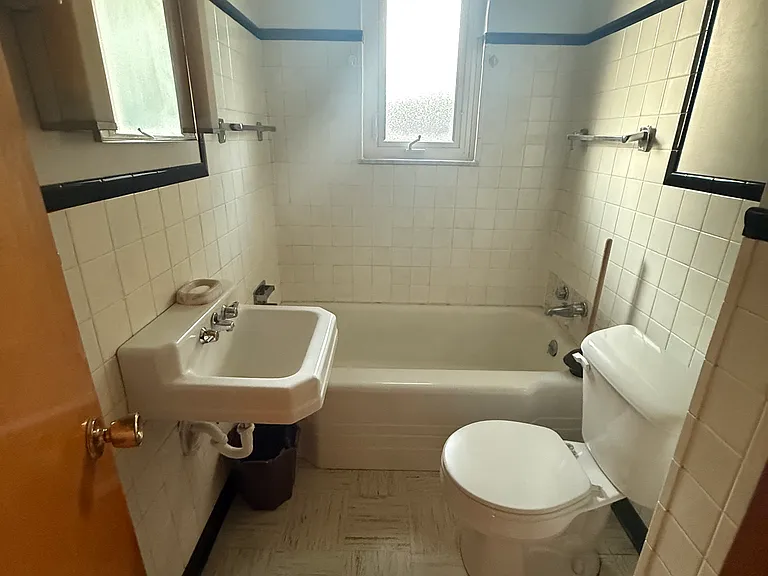 Full Bath w/ tub/shower, sink, medicine cabinet, new camode, and linen closet.