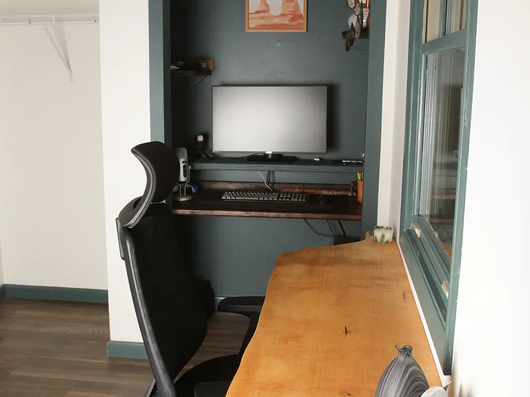 floating live edge desk with window view