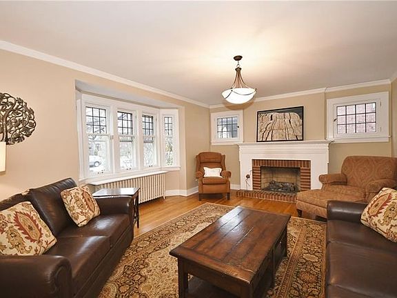 Natural sunlight abounds in the spacious living room