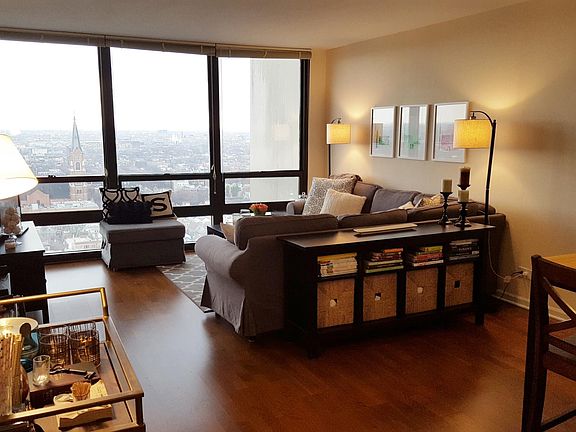 Spacious Living Area with Amazing Western City Views & Sunse