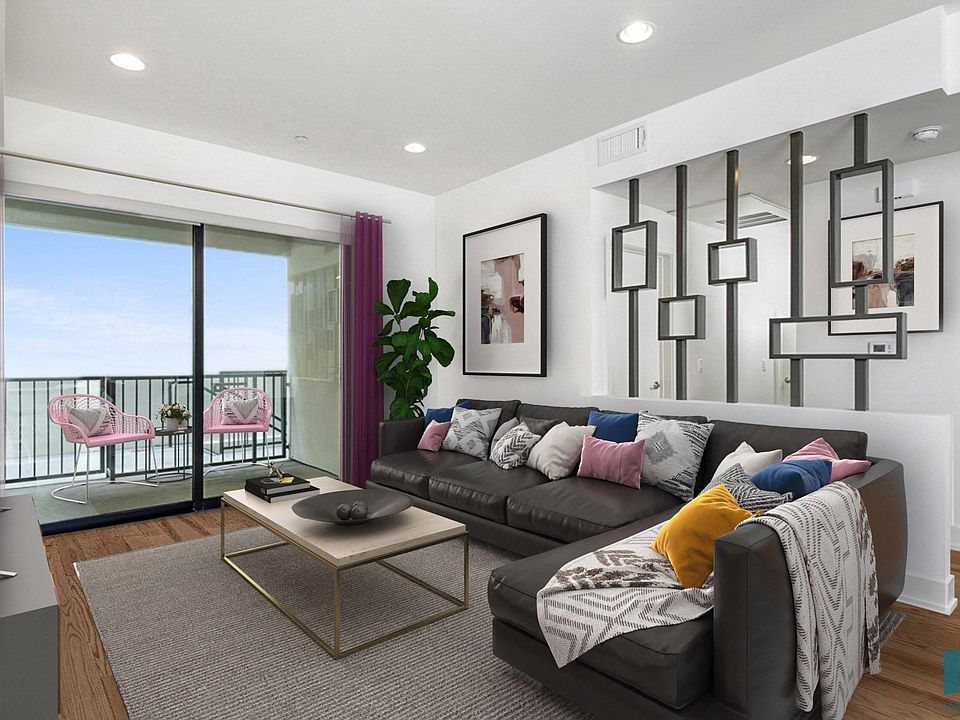 Living Room with Patio, Recessed Lighting, and Vinyl Flooring
