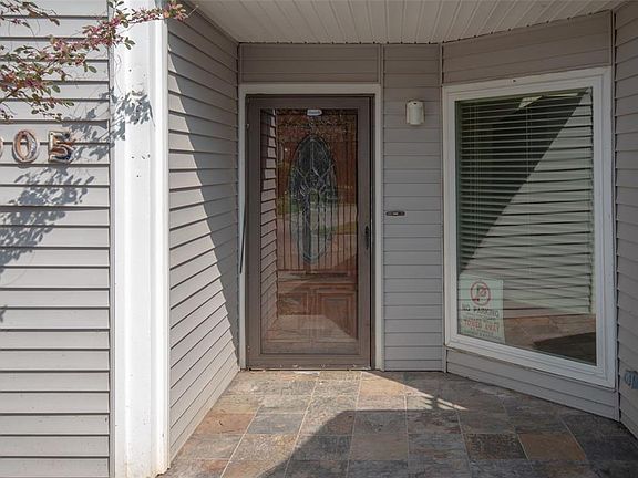 Front door and home is cover with vinyl windows and double pane windows