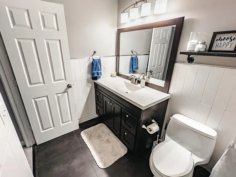 Upper level full bathroom. Extra tall vanity and modern finishes!