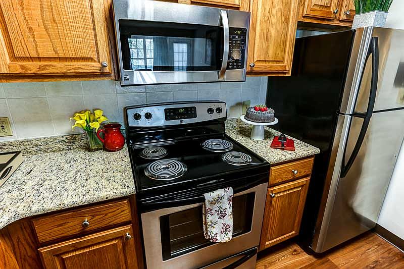 Homey Kitchen Featuring Stainlness Steel Appliances