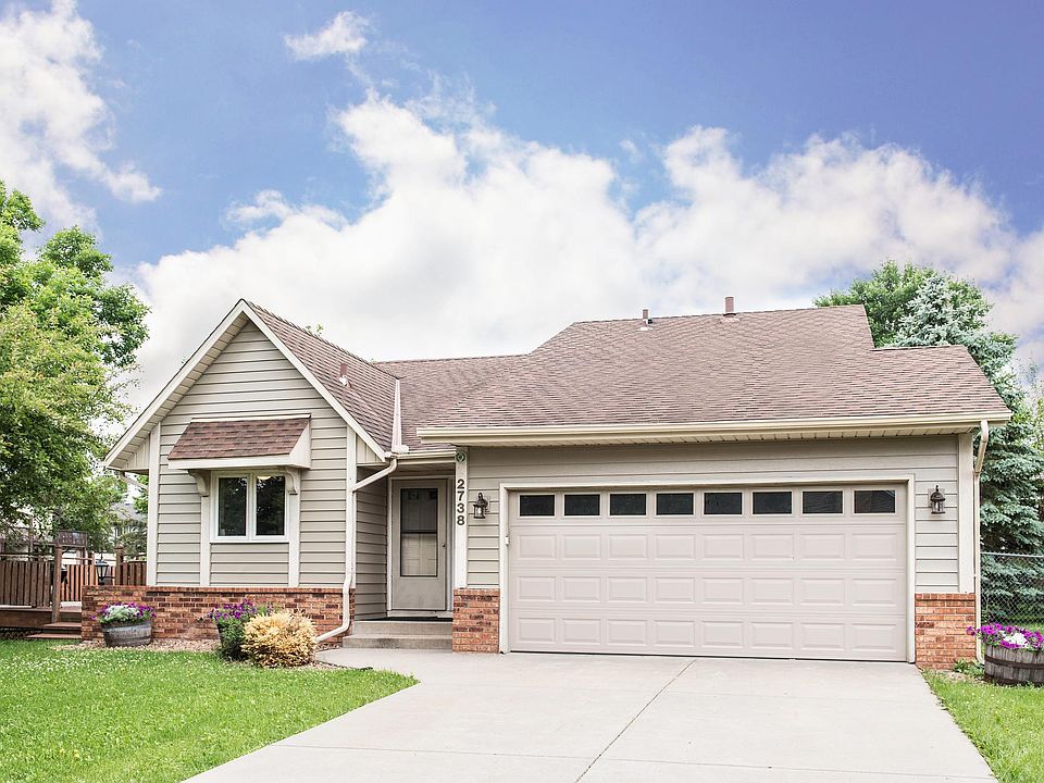 Cozy 4 Bedroom Bi-Level home with large front yard large corner fenced yard. Plenty of parking on driveway.