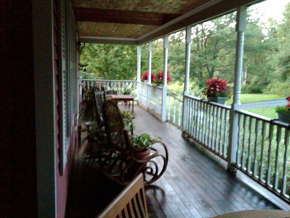 8 foot wide wrap around porch, mahogany floors