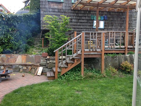 Fenced, private Backyard seating and garden