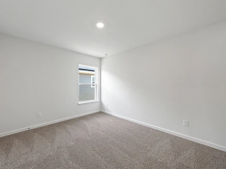 The flex room of the Sabine is a great space for an at-home office, playroom or guest room.