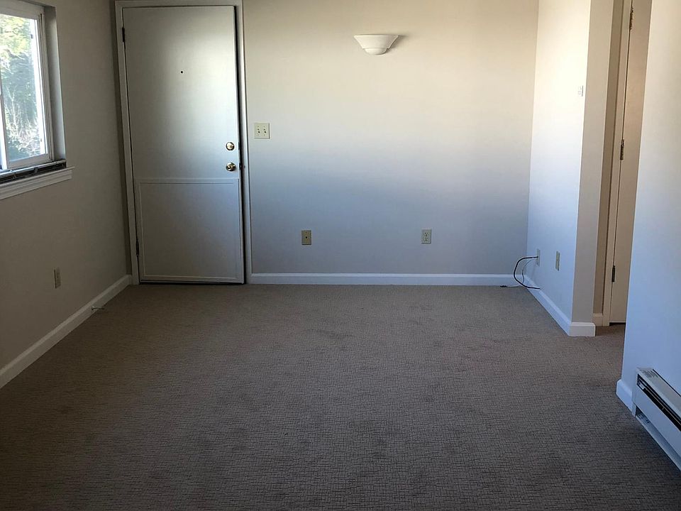 Looking from kitchen to entry door.