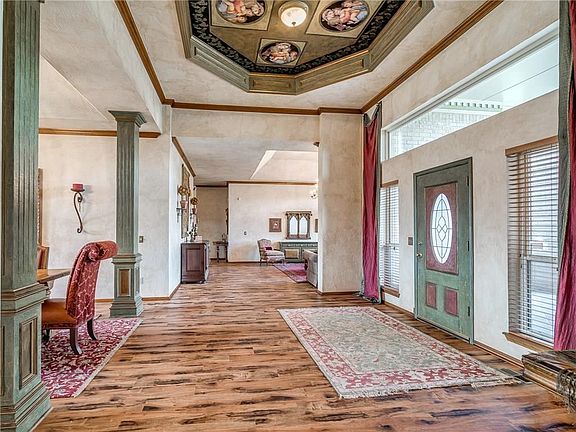 This charming home is on a corner lot with a circular drive.