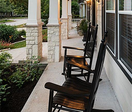 Relax with your favorite beverage on the front porch while watching hummingbirds flutter around the native Texas perennial garden.