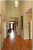 Open living, tall ceilings and wonderful warm colors