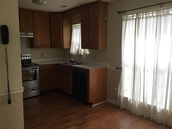 Kitchen showing dining area.