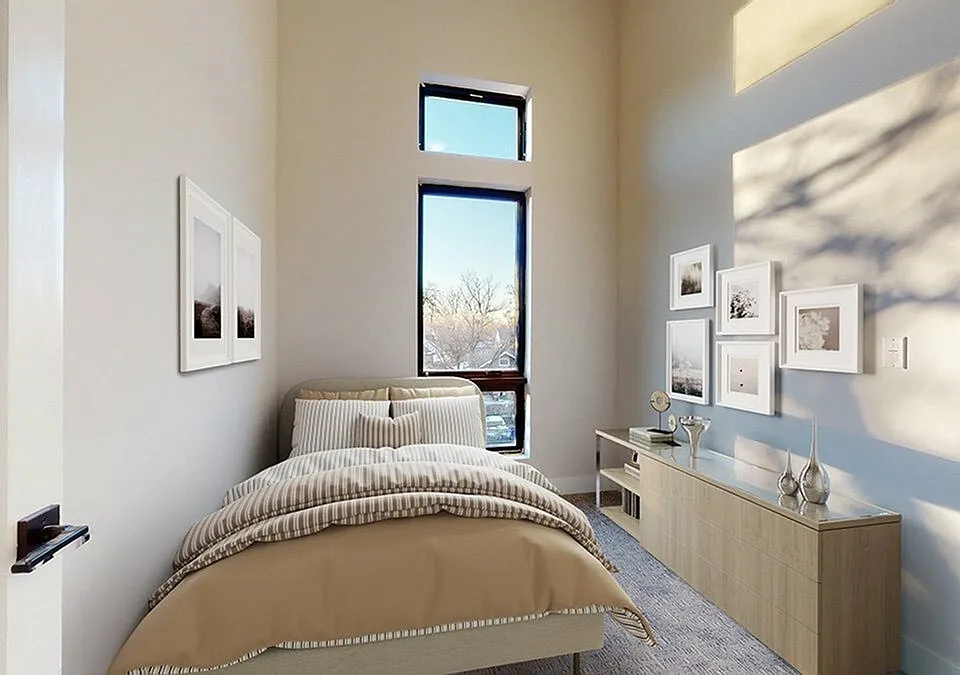Bright Bedroom with Large Windows and High Ceilings