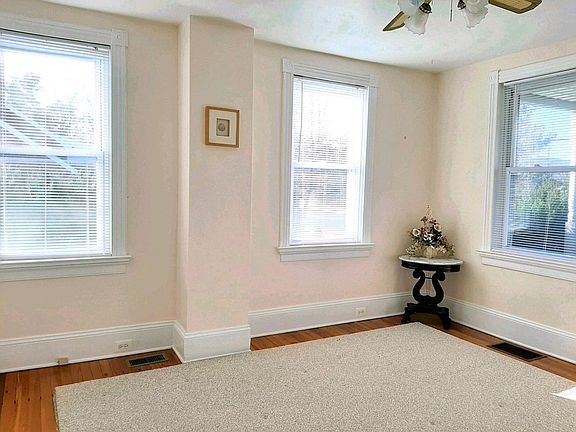 Master bedroom. Rooms have refinished hardwood floors and very clean, hypoallergenic area rugs.