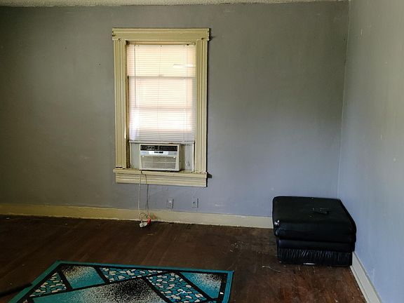 Living room/ small window unit ..house stays cool during summer/ central heating unit in attic.